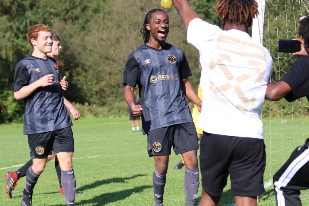 Stretford Paddock marked their first ever competitive fixture with a win against Bury Amateur AFC, in what was a hard fought 4-2 victory. Casey Evans reviews the match...